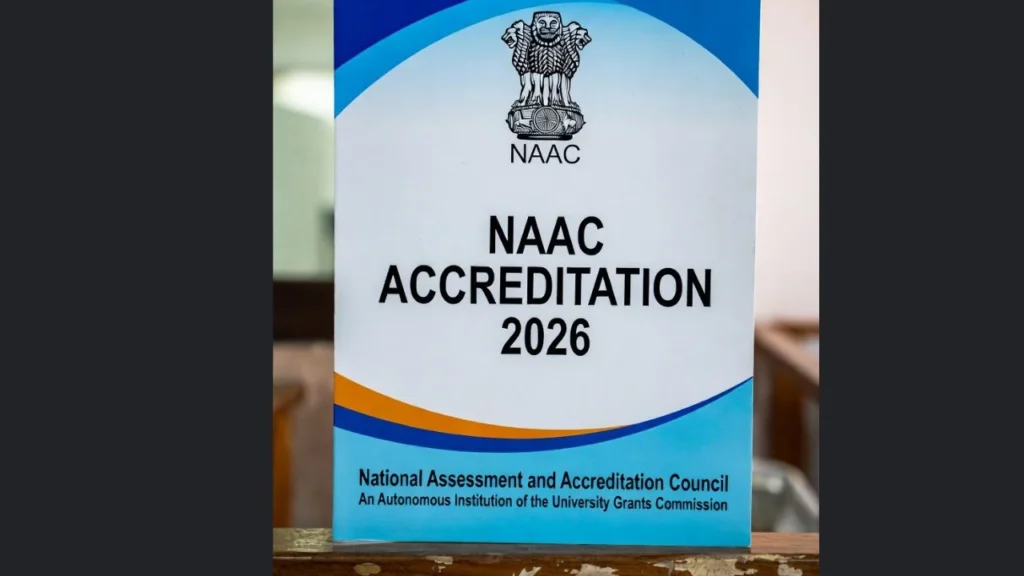 NAAC Accreditation 2026 banner from the National Assessment and Accreditation Council displayed on a campus wall